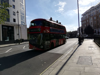 Double deck coach (characteristic for London), blue sky (not even)