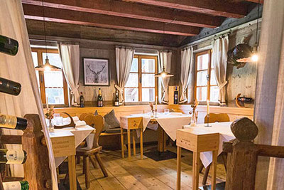 Aussenansicht vom Restaurant Luis Alm in Sexten Moos in Südtirol