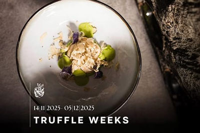 Fein angerichtetes Gourmetgericht mit Trüffeln im Romantik Hotel Stafler; Hinweis auf die „Truffle Weeks“