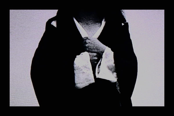 close up of torso with arms crossed