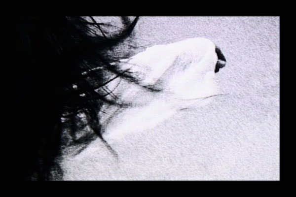 close up of hair and arm in sleeve