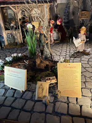 Johanniswein an der Milieukrippe von Lyskirchen