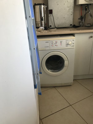 Buanderie avec lave linge