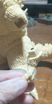 and magnet-embedded part of left arm