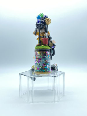 103 Chauncey Gardiner  11.5cm x 12cm x 22cm  Mixed Media  2020