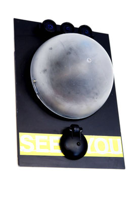 See You (2024) upcycled plastic and metal parts, paper 30 x 22 x 12 cm