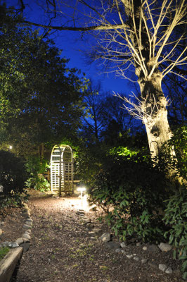 This resort-like, multilevel backyard with winding paths and a streaming brook cutting across it...was the ideal canvas for a lighting designer to extend the use of this amazing yard into the evening hours. Montvale, NJ