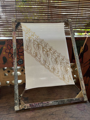 Batik wax outline on framed cotton cloth 