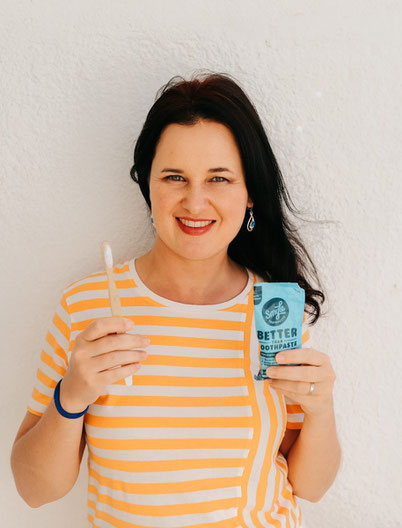 a happy face of a person who has just cleaned her teeth with an ecological toothpaste