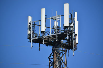 A base station cell tower in a 5G 4G network showing the radio transmitter and receiver.