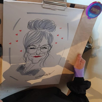 Live-Karikaturen auf einem Herbstmarkt