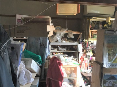 練馬区防護服を着て清掃中