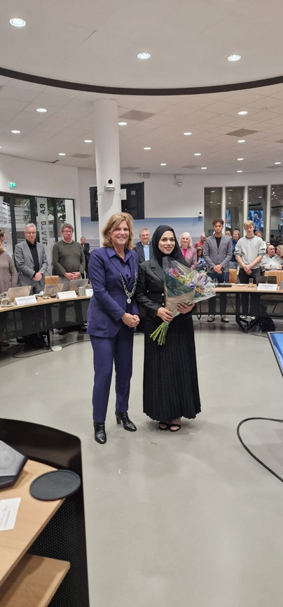 Burgemeester Margreet van Driel en duo-raadslid Alaa Haj Hussein