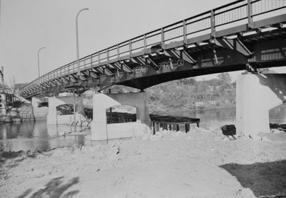 View of the recently completed bridge, looking southeast. Erection and field welding were completed on Monday, 16 May 1949