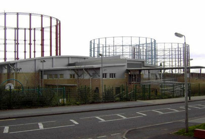 Windsor Street Gas Works - gasometers off Avenue Road. The building in the foreground is Nechells Sports Centre in Rupert Street c2000.