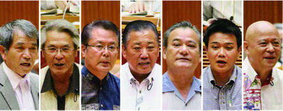 (右から)質問する山川氏、新垣氏、具志堅氏、中川氏、座波氏、座喜味氏、又吉氏=21日、県議会