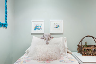 Come on over and hug this loveable stuffed elephant.