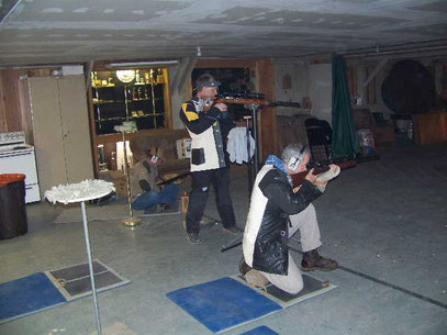 Bret Bogar standing.   Larry Hammond kneeling.  Weekly postal shoot for Inland Empire .22 cal rifle League.