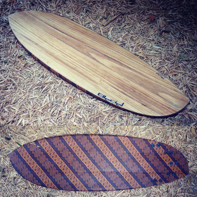 Asymmetrical surfboard paulownia wood