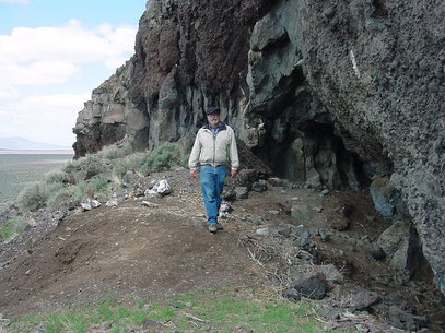 “Paisley Caves, above the Summer lake plain, Oregon. In these caves some of the oldest human remains in North America were found. Bill Cannon, archaeologist of the BLM Lakeview, district in the center.”  Photo from Wikimedia Commons.