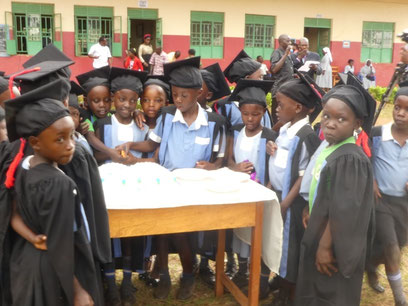 Cutting the cake on Top Class Graduation 2016