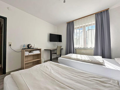 Zwei-Bett-Zimmer mit getrennten Betten