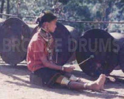 Fig. 7. Playing a drum in a Kayah (unproperly said “giraffe”) village nowadays.