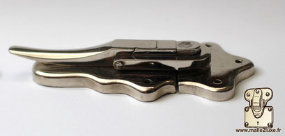 Nickel-plated brass lever latch.