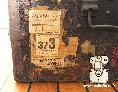 Trace of hotel labels, old Louis Vuitton trunk