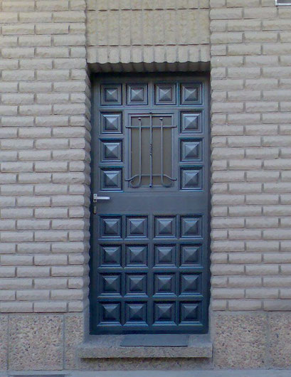 puerta forja y cuarterones