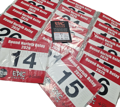 Custom printed premium runner race bib numbers produced for the Round Norfolk Relay running event.