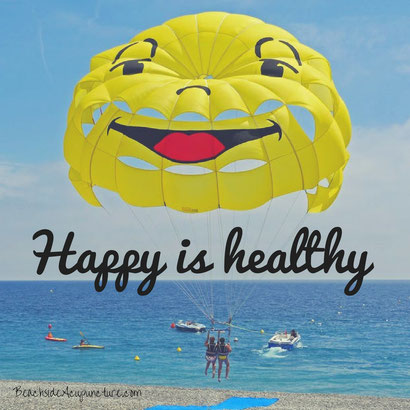 happy is healthy over beach