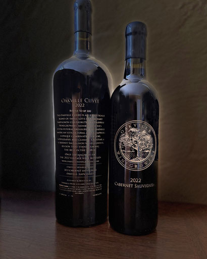 Image of two 750ml bottles of the Oakville Cuvee showing front and back etched labels