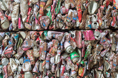 Stack of crushed cans for recycling.