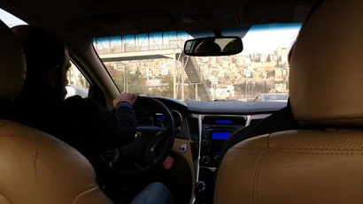 The taxi to Amman city centre goes through some interesting neighbourhoods.