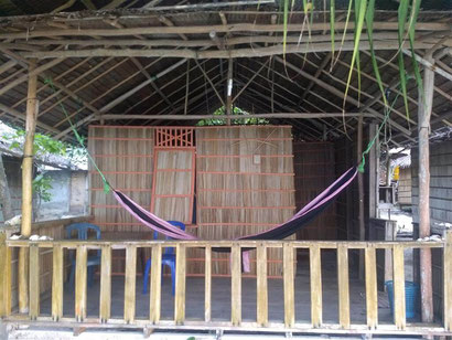 Our basic but VERY affrdable beachfront bungalow at Mambetron Homestay