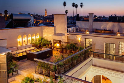 Riad Star's rooftop terrace at night