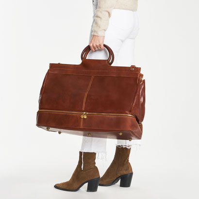 Brown leather duffle bag