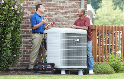 technician performs air conditioner maintenance in Warner Robins