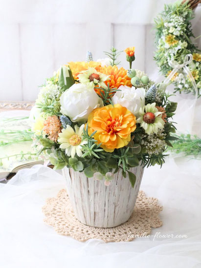 開店祝い花 オレンジの造花アレンジ