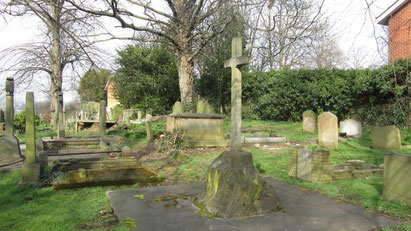 The Bateman family grave is the one in the foreground with the cross. It is near the gate of the graveyard.