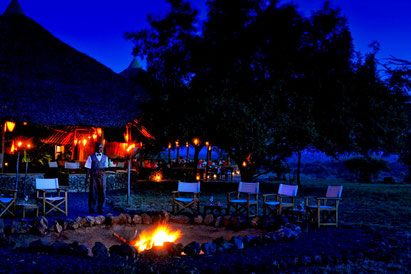 Fire at night, Severin Safari Camp, Tsavo National Park, Kenya. Dante Harker
