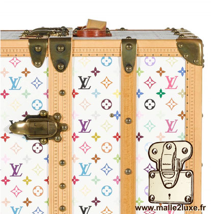 In 2002 While only leather-covered luggage had leather trim, this is a big change at Louis Vuitton. Marc Jacobs collaborates with Takashi Murakami and launches the Monogram multicolore Blanc and Multicolore Noir, these canvas luggage