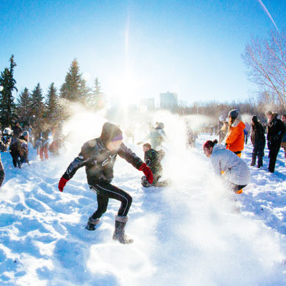 Large group of people having a snowball fight at #yegsnowfight in Edmonton