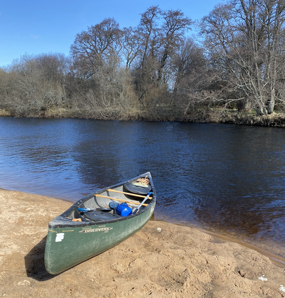 Canoe on sandy beach