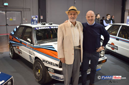 Lancia Delta to74785l colori Martini realizzata da mais vinicio in pubblimais che posa con miki biasion campione del mondo presso vicenza fiera