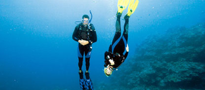 Photo of diver doing hovering in mid water during a PADI specialty course peak performance buoyancy in Nusa Penida