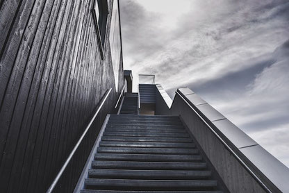 Executive search process illustration with stairs symbolizing the five stages of a retained executive search assignment.