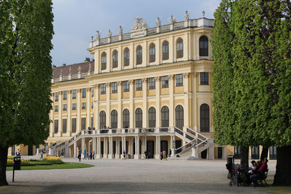 A glimpse through the lanes of the garden of Schönbrunn Palace facing the facade of the most beautiful palace of Vienna.
