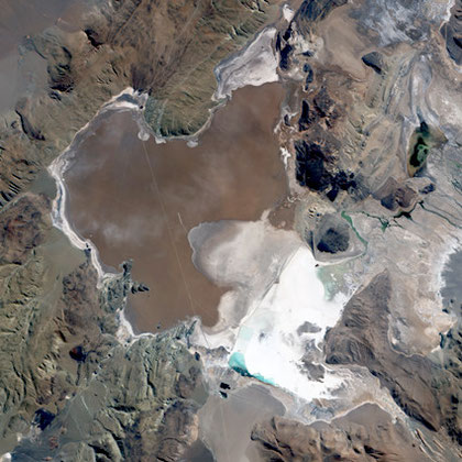 Salar del Hombre Muerto, in northwestern Argentina. A salar is a salt pan, created when water repeatedly evaporates from a shallow lake, leaving behind a crusty layer of salt minerals, which are brilliant white in  EO-1 satellite image.©NASA GSFC.